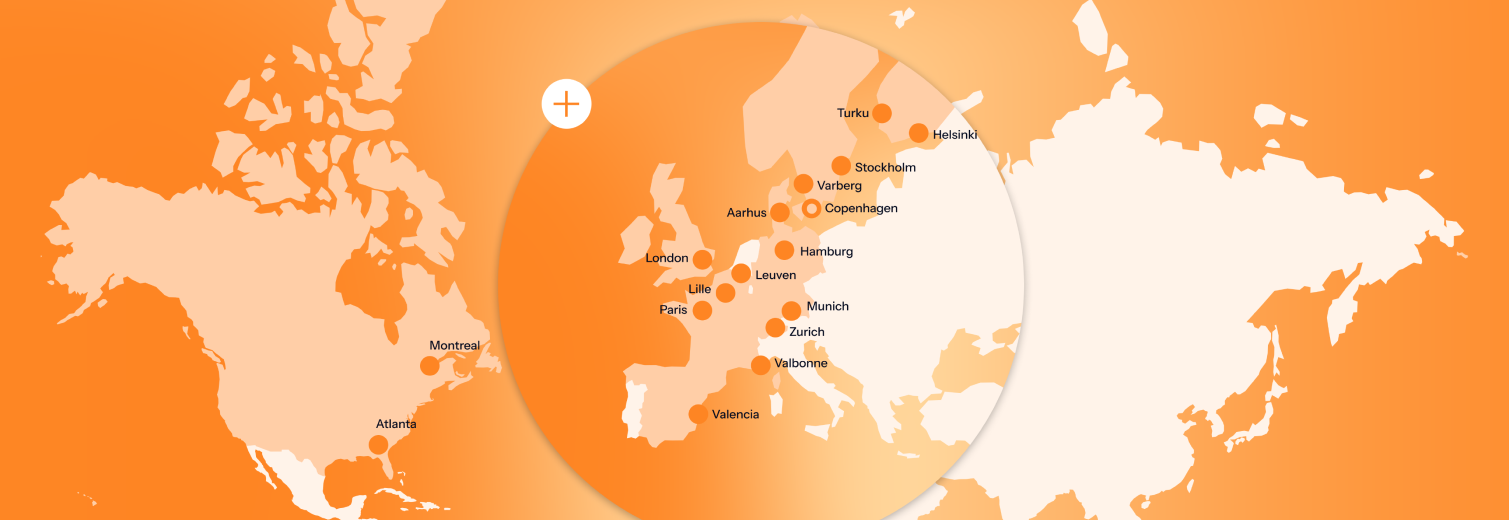 Orange flat world map with dots marking LanguageWire office locations and a zoomed-in circle over Europe for detail.