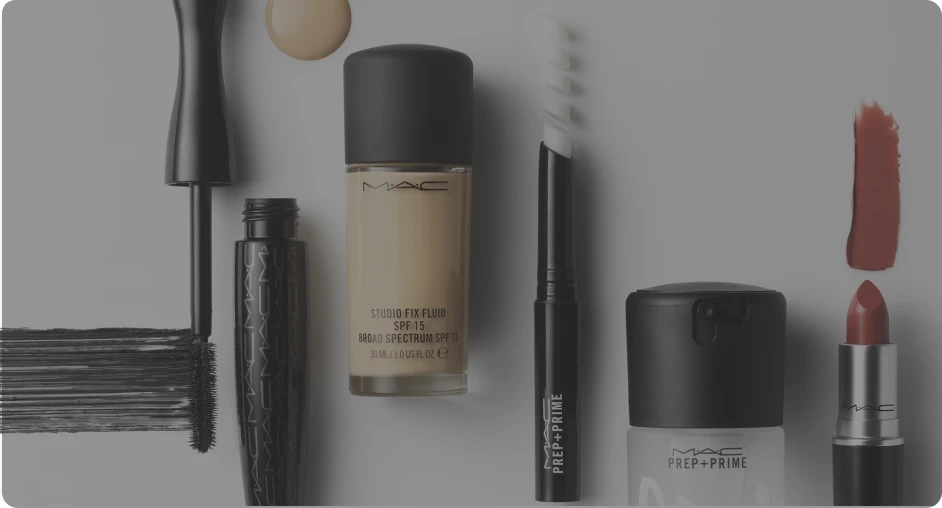 MAC Cosmetics product lineup on grey background